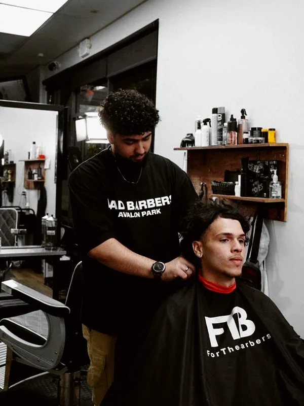 Jaeyden, barber at Mad Barbers Avalon Park