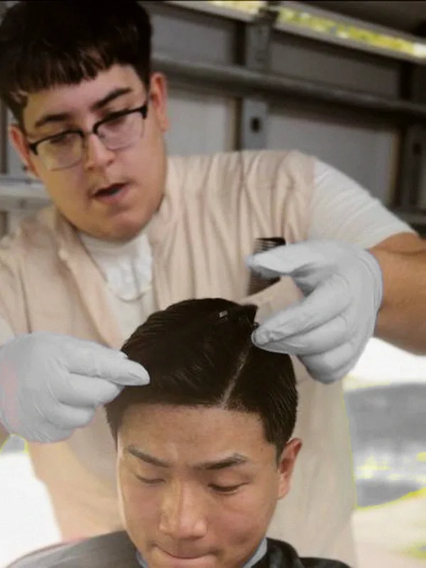 Jan, barber at Mad Barbers Avalon Park